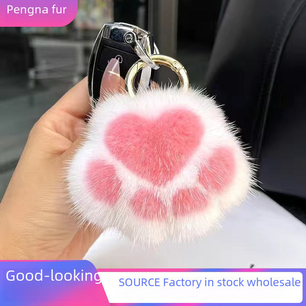 Llavero de peluche con forma de garra de gato 